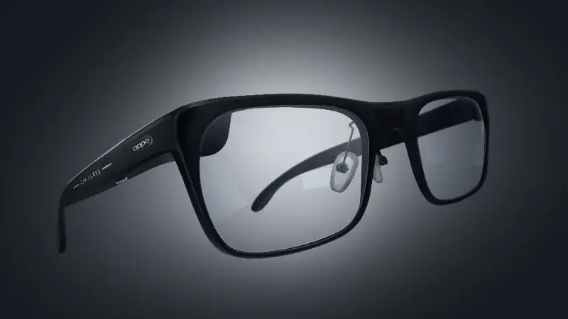 A pair of black Oppo Air Glass 3 smart glasses with sleek frames and transparent lenses, set against a dark background.