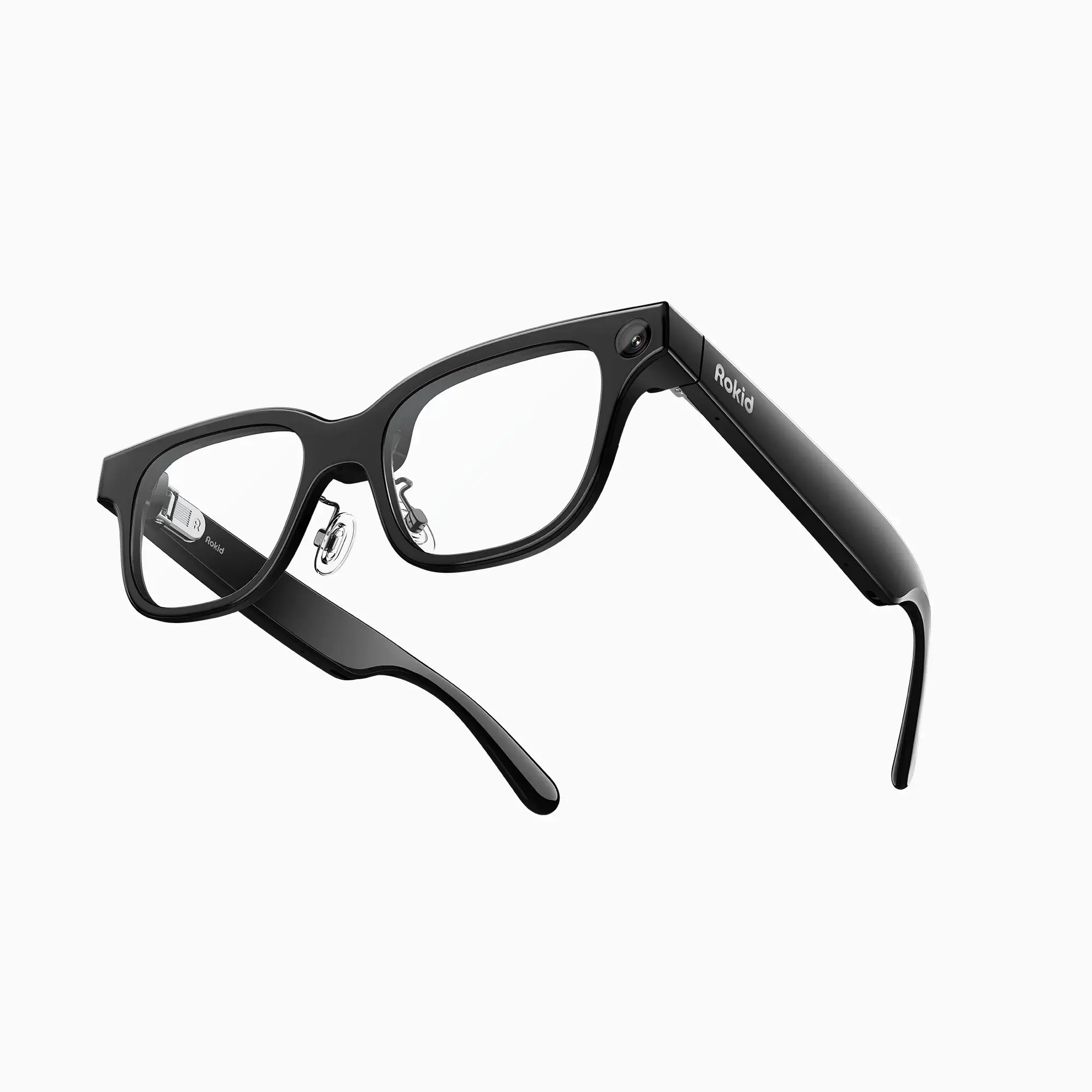 A pair of black Rokid AR Lite smart glasses with transparent lenses and a built-in camera on the front, set against a plain white background.