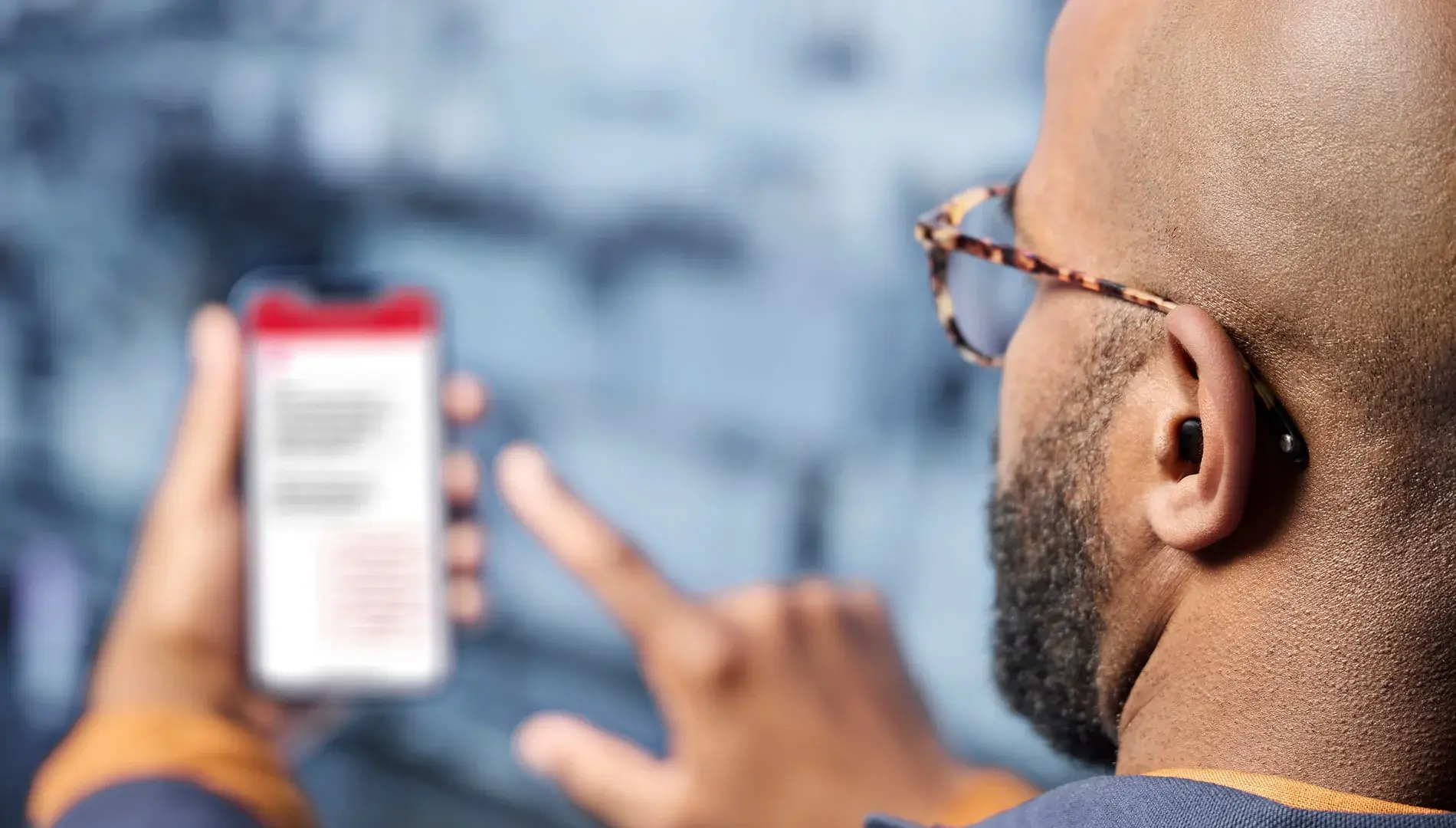 Man wearing Insio CIC IX taking phone call — discreet connectivity